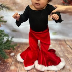 Santa baby bell bottom velvet pants.